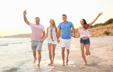 Group of attractive young people on beach