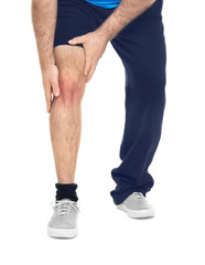 Overweight man suffering from knee pain on white background