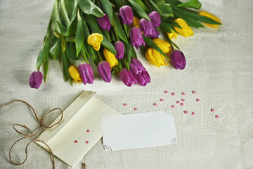 Close-up of a holiday bouquet of tulips, a note space for your text