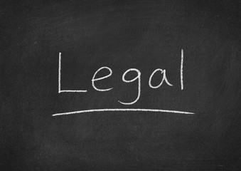 legal concept word on a blackboard background