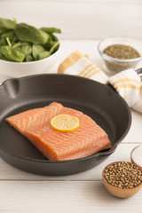Beautiful Pink Salmon on a Rustic White Wood Table