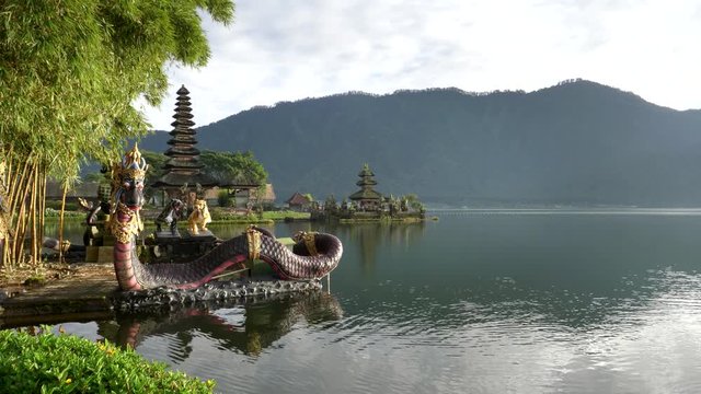 dragon water fountain sculpture at pura danu bratan temple in bedugul on the island of bali, indonesia