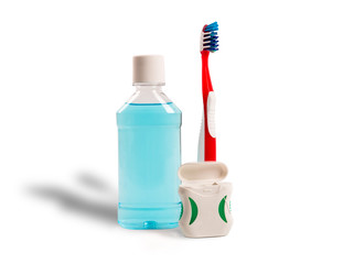 Tooyhbrush with mouthwash ,dental floss isolated on white background.