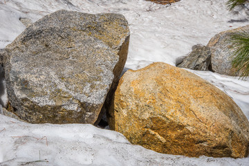 stones in the snow at yosemite 