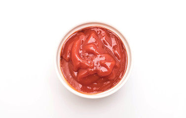 ketchup or tomato sauce in saucer