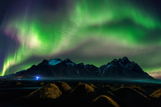Northern Light, Aurora borealis at Vestrahorn mountains in Stokksnes, Iceland.