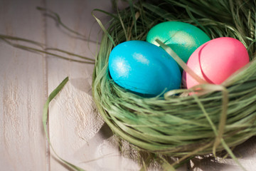 Colorful easter eggs in basket a