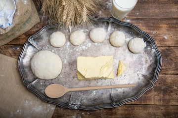 Natural organic ingredients to make cookies as dough, flour, eggs, butter,milk