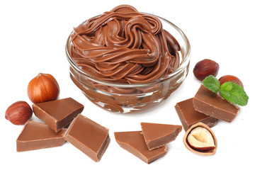 chocolate cream with hazelnut isolated on white background. cream in glass bowl