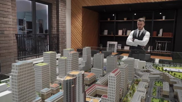 Master-builder is watching a layout