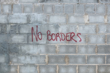 The wall with inscription no borders