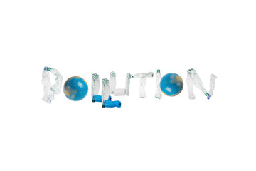 Letters made of plastic bottles and globe form word “pollution”on isolated white background; our irresponsible, excessive consumerism of plastic, social advertising; world environment day concept