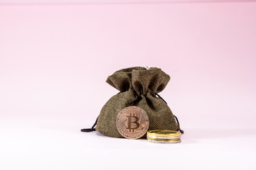 The digital currency coins on pink background