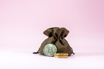 The digital currency coins on pink background
