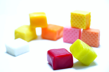  Colored chewing sweets on white background
