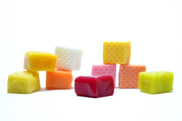  Colored chewing sweets on white background