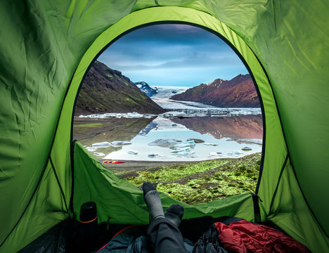 Camping at glacier with cold lake in Iceland