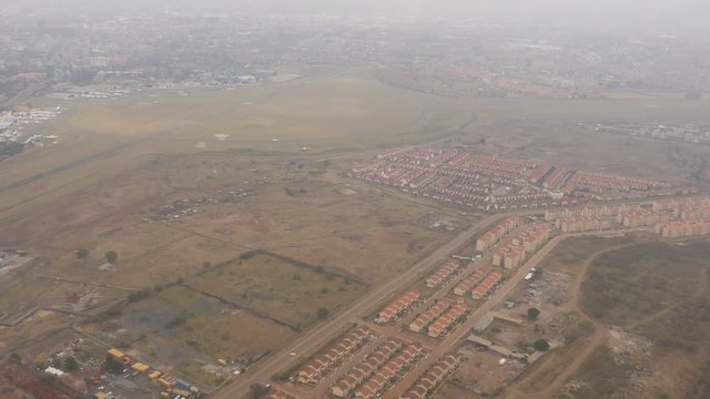 Aerial view of a city on a cloudy day