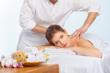 Fototapeta na wymiar Beautiful, young and healthy woman in spa salon. Massage treatment