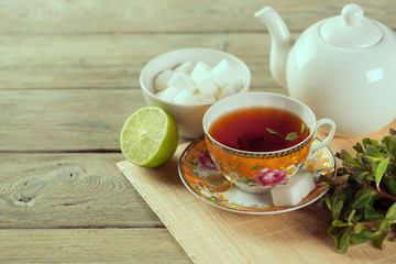 Cup of tea on wooden table