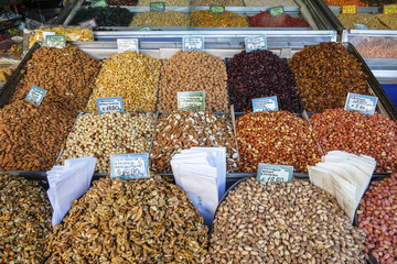 Assorted nuts for sale in the market with price signs written in Greek. Athens. Greece.
