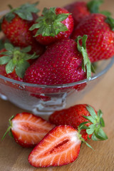Fresh strawberries on old wooden background