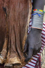 Fototapeta na wymiar Close-up of a hand of a woman from the karo tribe, Omo valley, Ethiopia.