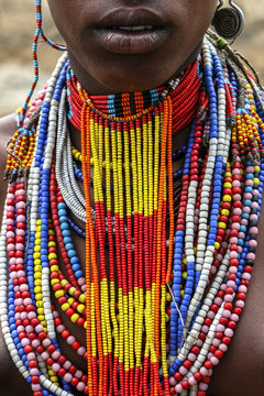 Close-up of a woman from the Arbore tribe with traditional jewelry, Omo valley, Ethiopia.
