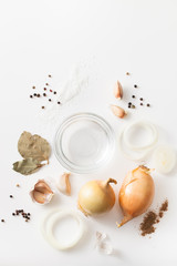 Set of spices for barbecue marinade on white background