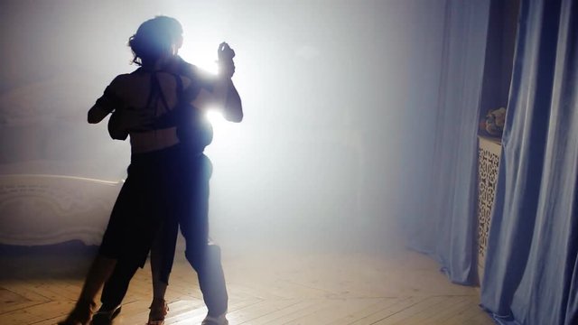 Beautiful couple dancing tango