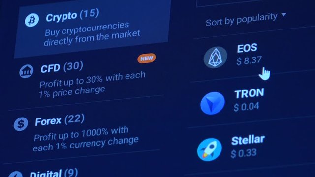 A list of cryptocurrencies on the crypto market on a computer screen - closeup