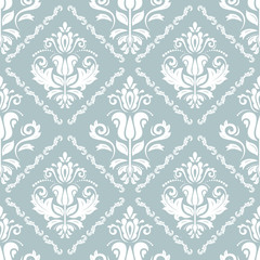 Damask classic light blue and white pattern. Seamless abstract background with repeating elements. Orient background