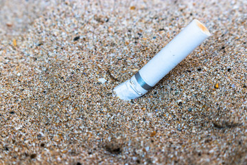 Cigarette butts was left on the sand