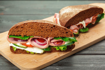 sandwich on a wooden table