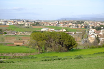Fototapeta na wymiar Greenfield and hill in Mollet del Valles in Barcelona province in Catalonia Spain