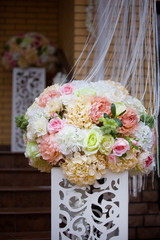 The composition is made by florists from fresh flowers.