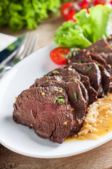 Hanger beef steak with orange sauce