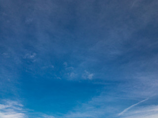 Blue sky with small clouds