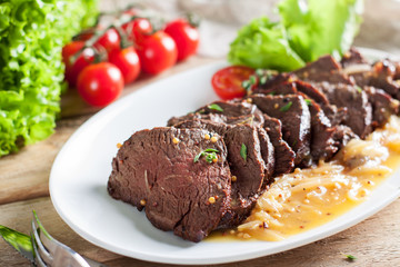 Hanger beef steak with orange sauce