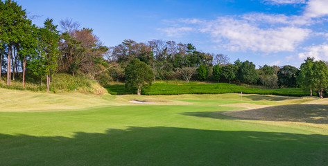 Panorama view of Golf Course where the turf is beautiful and green in Japan. Golf course with a rich green turf beautiful scenery.