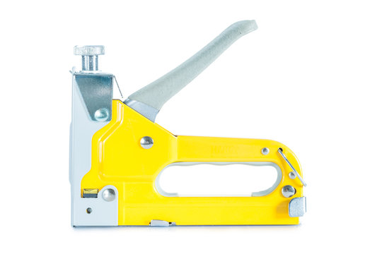 Construction stapler gun isolated on white