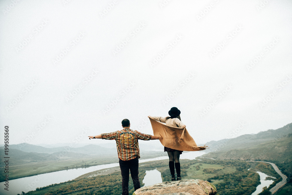 Wall mural happy lovers have a time outdoors