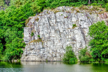 Fototapeta na wymiar White cliff standing tall with water