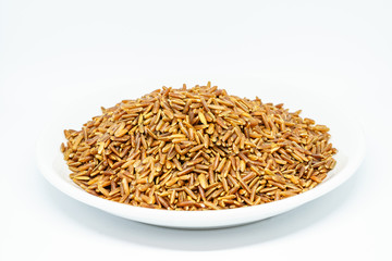Brown rice white isolated. The whole grain rice, the inedible outer hull removed; white rice is the same, bran layer and cereal germ removed. Red rice, gold rice, and black rice are all whole rices