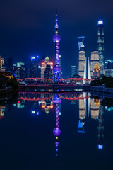 Shanghai Skyscrapers and reflections on the river at night