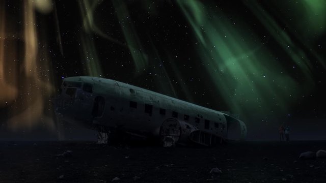 aurora borealis crashed DC-3 Plane Solheimasandur winter sky tourism night timelapse