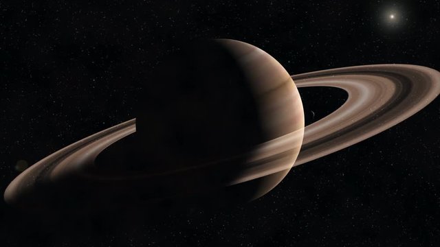 Saturn from space - realistic and beautiful - approaching planet with rings - sun and stars in 4K and 1080 HD