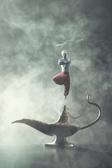 Genie coming out of a whishes lamp - obrazy, fototapety, plakaty