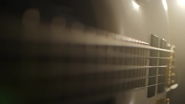 Slowmotion shot of bass string vibration.