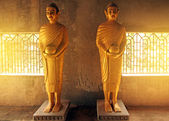 Cambodia. Golden statues of the gods